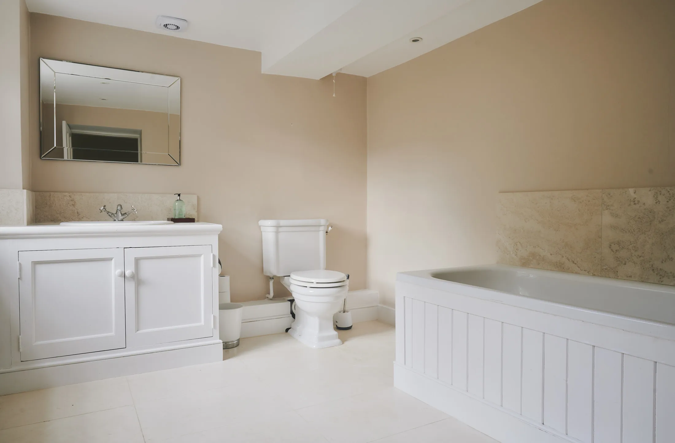 Clean-lined bathroom with vintage-style fittings at Havenwood, a Domus Stay luxury property for countryside escapes.